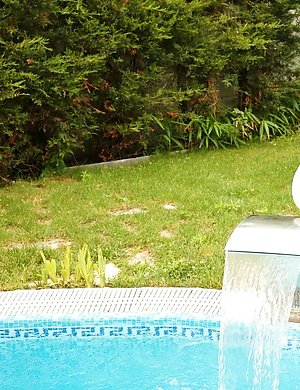 This big housewife gets naughty at the pool