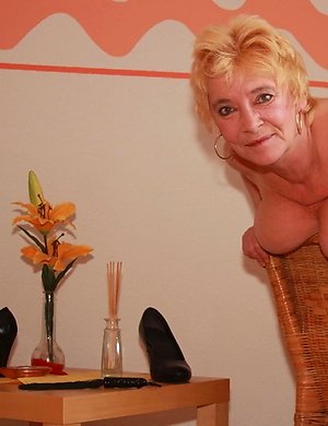 Naughty mature lady playing all alone